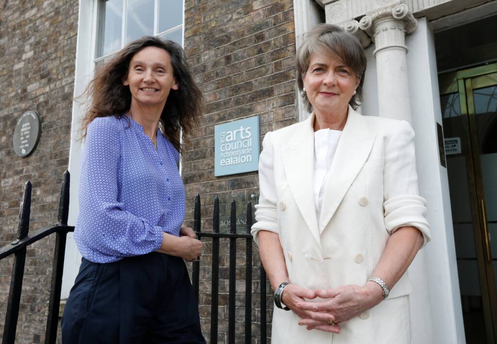 Director and Chair of the Arts Council, Maureen Kennelly and Maura McGrath stand outside the Arts Council Building